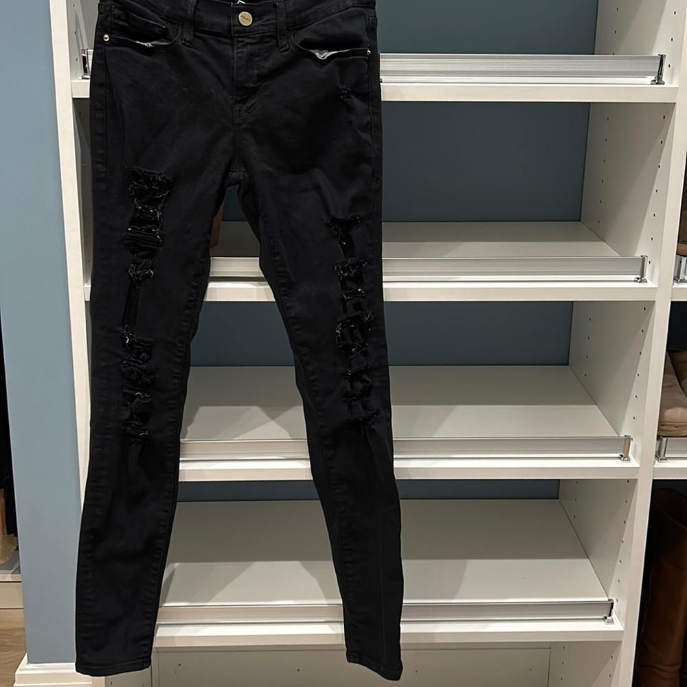 Black distressed jeans from Frame. Size 25.